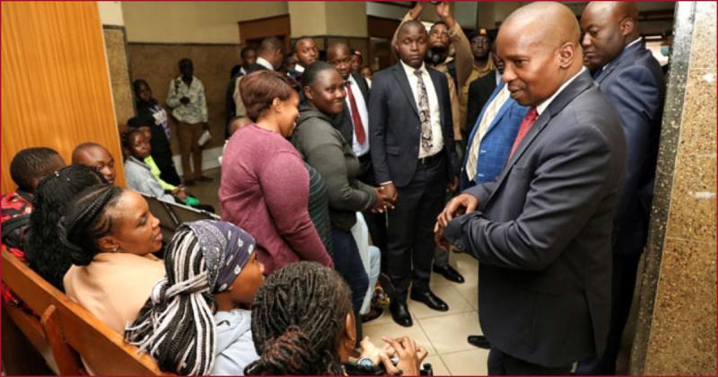 Interior CS Kithure Kindiki engaging passport applicants at Nyao House, Nairobi.